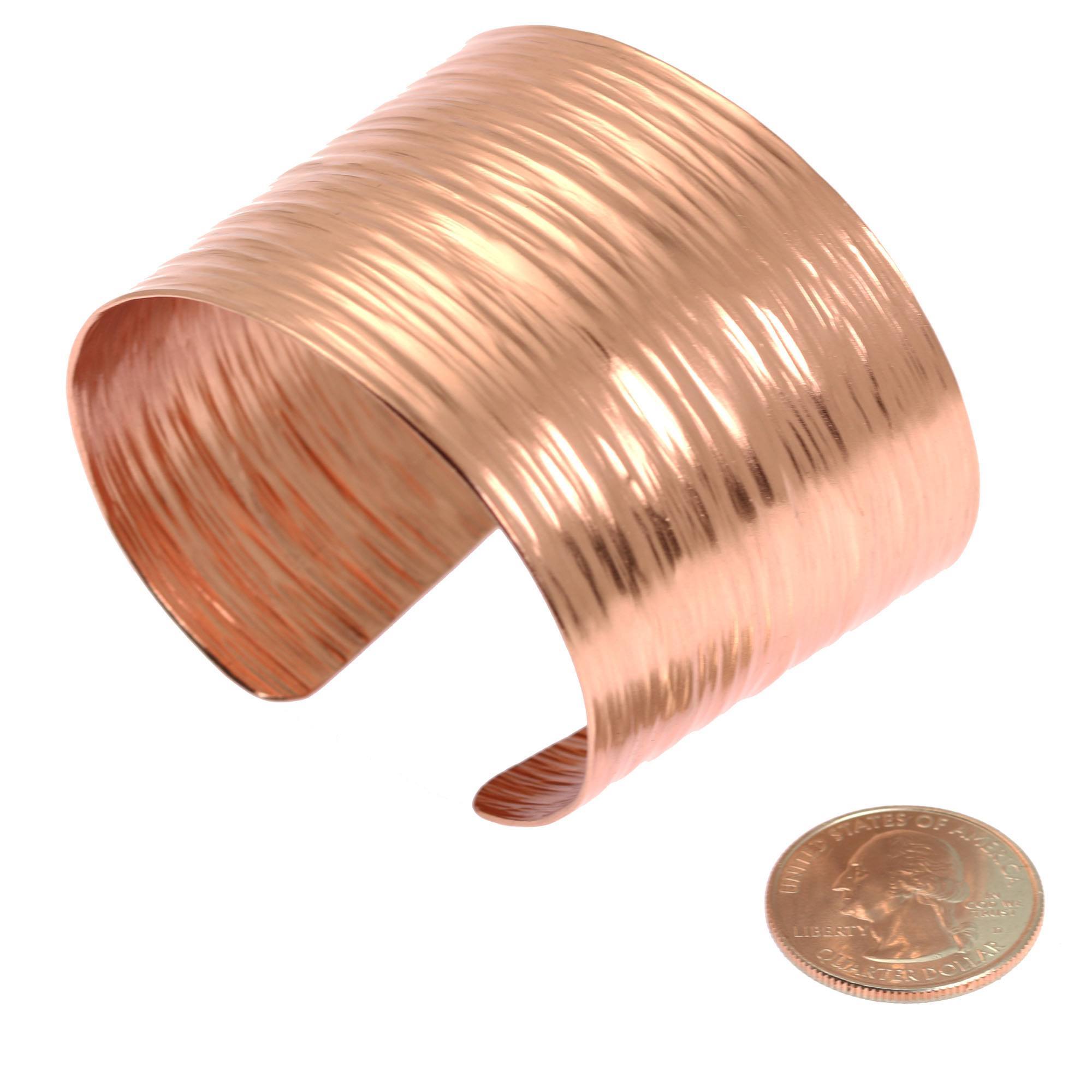 Width of Chased Copper Bark Cuff Bracelet compared to a US Quarter Coin