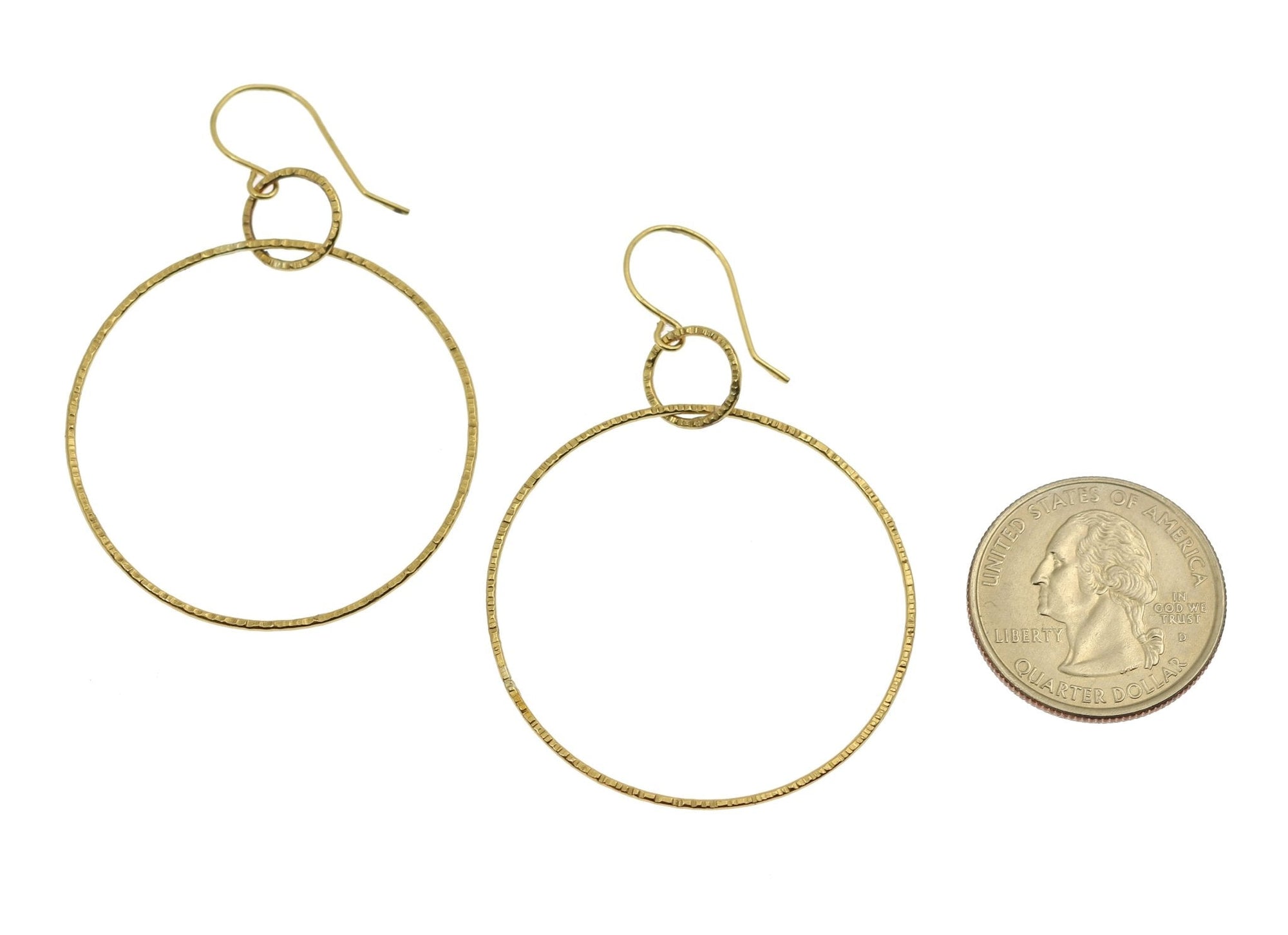 Size of Chased Nu Gold Brass Hoop Earrings compared to a US Quarter Coin