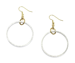 1 of 7: A Pair of Chased Rim Aluminum Hoop Earrings on a White Background