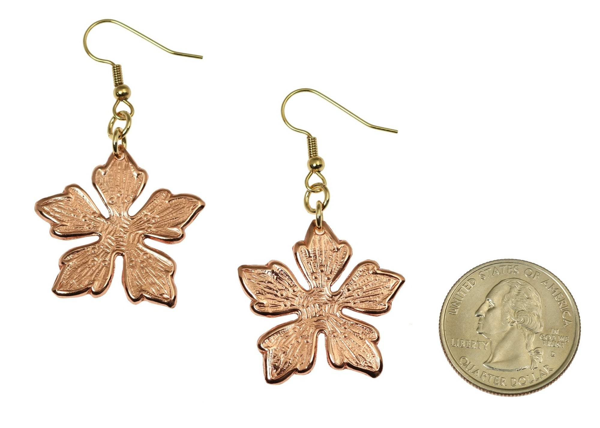 Size of Copper Buttercup Flower Earrings compared to a US Quarter Coin