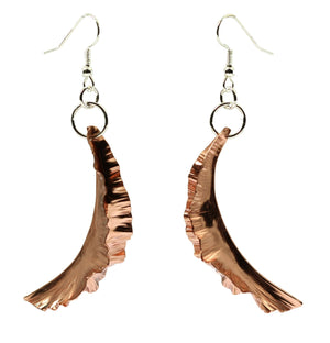 7 of 9: Copper Fold Formed Leaf Dangle Earrings Detail View on a White Background