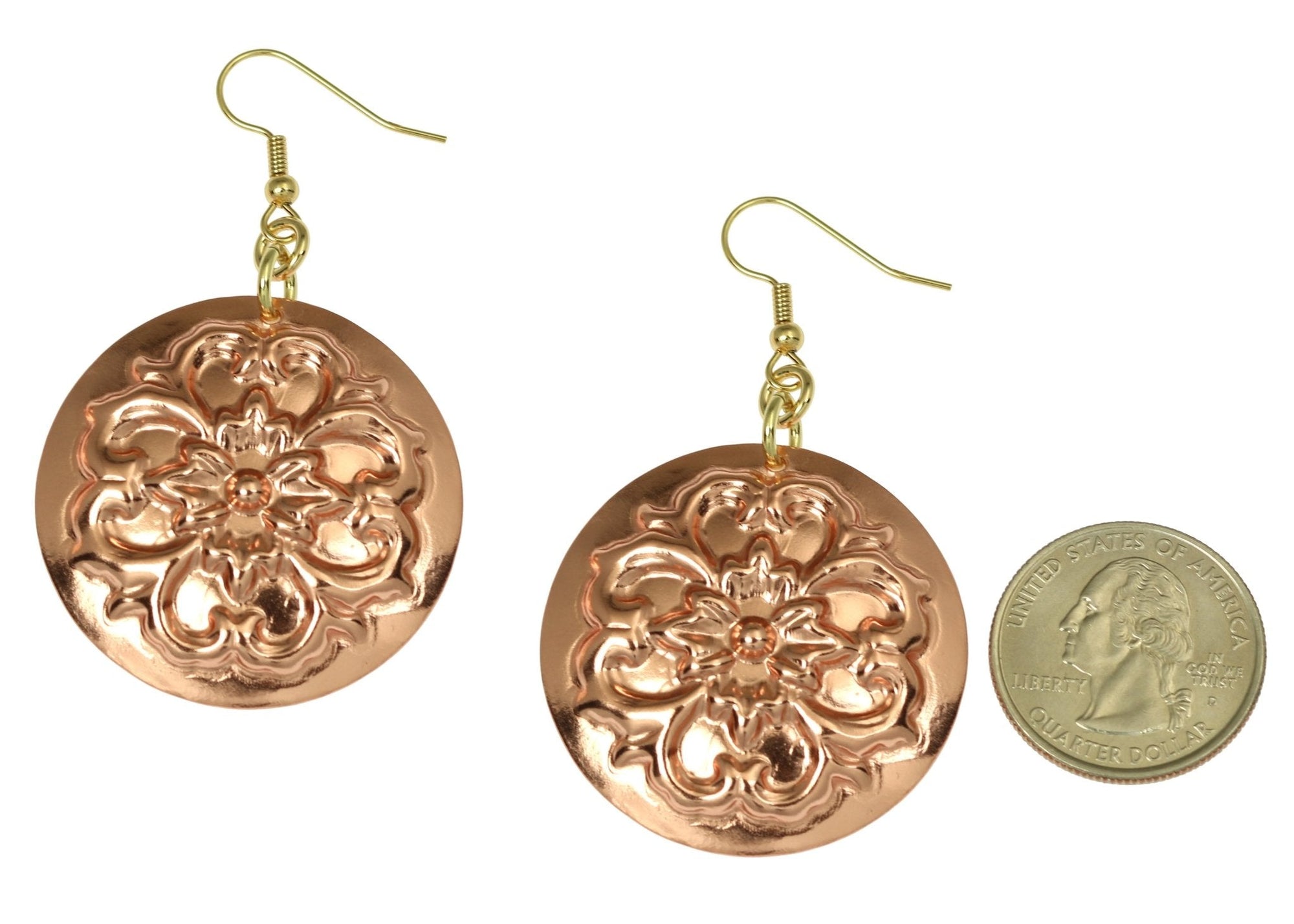Size of Copper Forget Me Not Disc Earrings compared to a US Quarter Coin