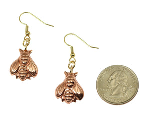 2 of 6: Size of Copper Honey Bee Drop  Earrings compared to a US Quarter Coin