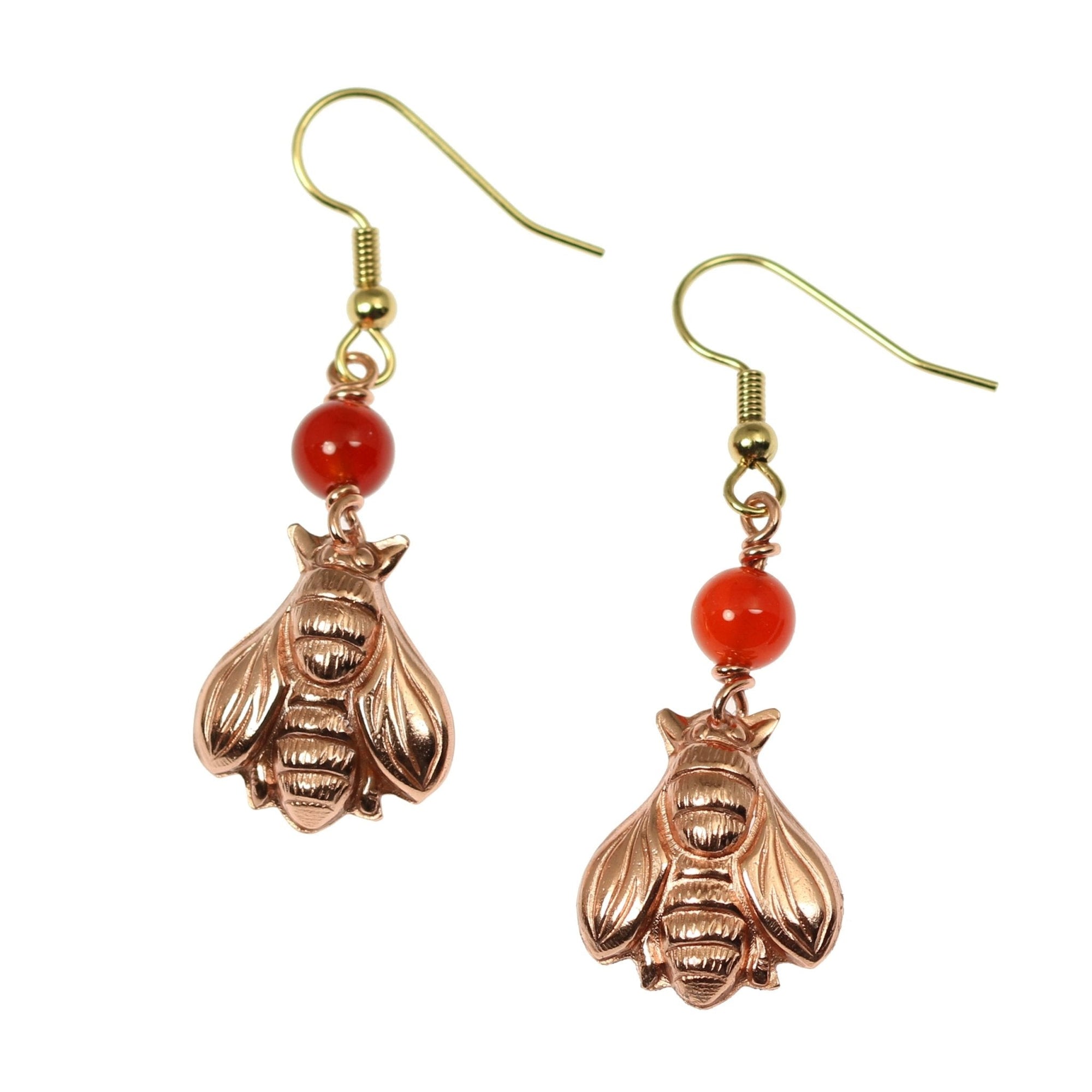 A Pair of Copper Honey Bee Drop Earrings With Carnelian on a White Background