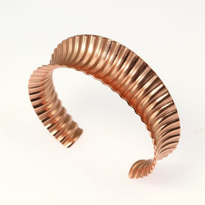 2 of 9: Corrugated Copper Anticlastic Tapered Cuff Side View