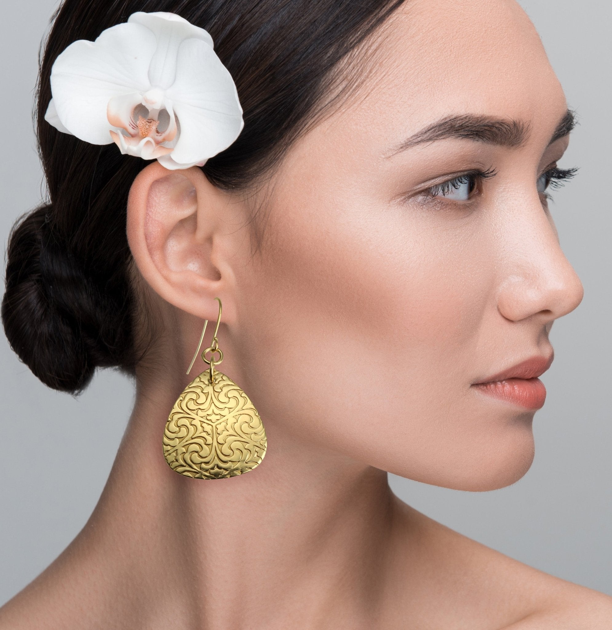 Damask Brass Nu Gold Triangular Earrings on Female Model