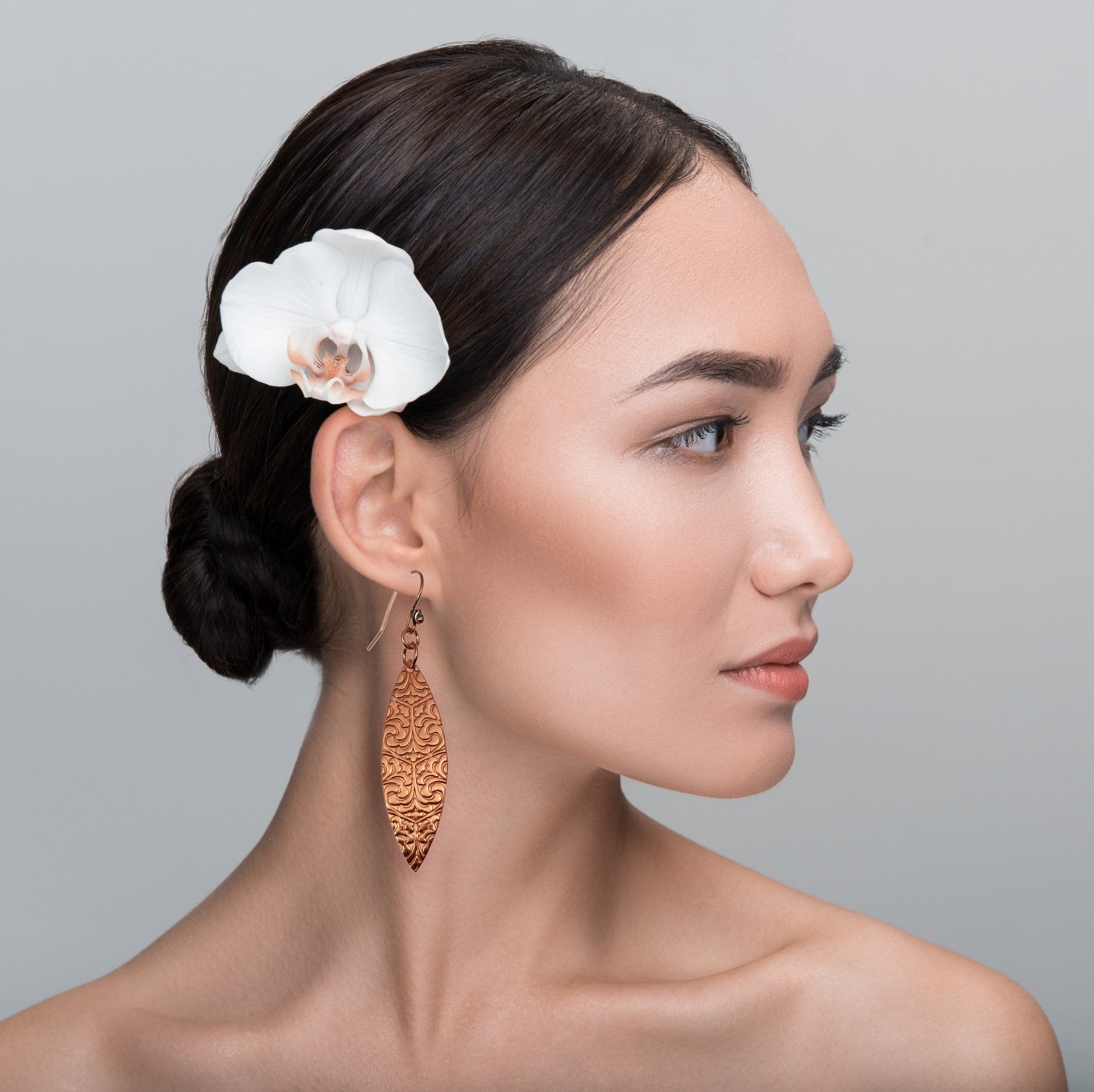 Damask Embossed Copper Marquise Earrings on Female Model