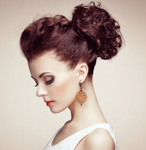 2 of 6: Damask Embossed Copper Moroccan Earrings on Female Model