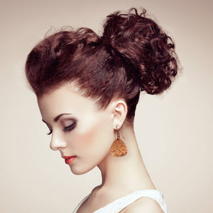 5 of 7: Damask Embossed Copper Triangle Earrings on Female Model