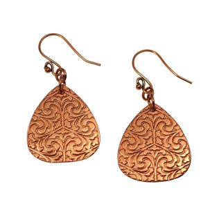 1 of 7: A Pair of Damask Embossed Copper Triangle Drop Earrings on a White Background