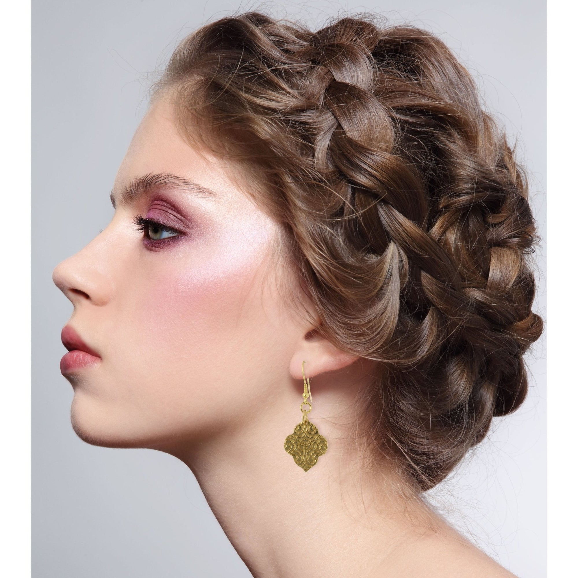 Damask Embossed Nu Gold Quatrefoil Earrings on Female Model