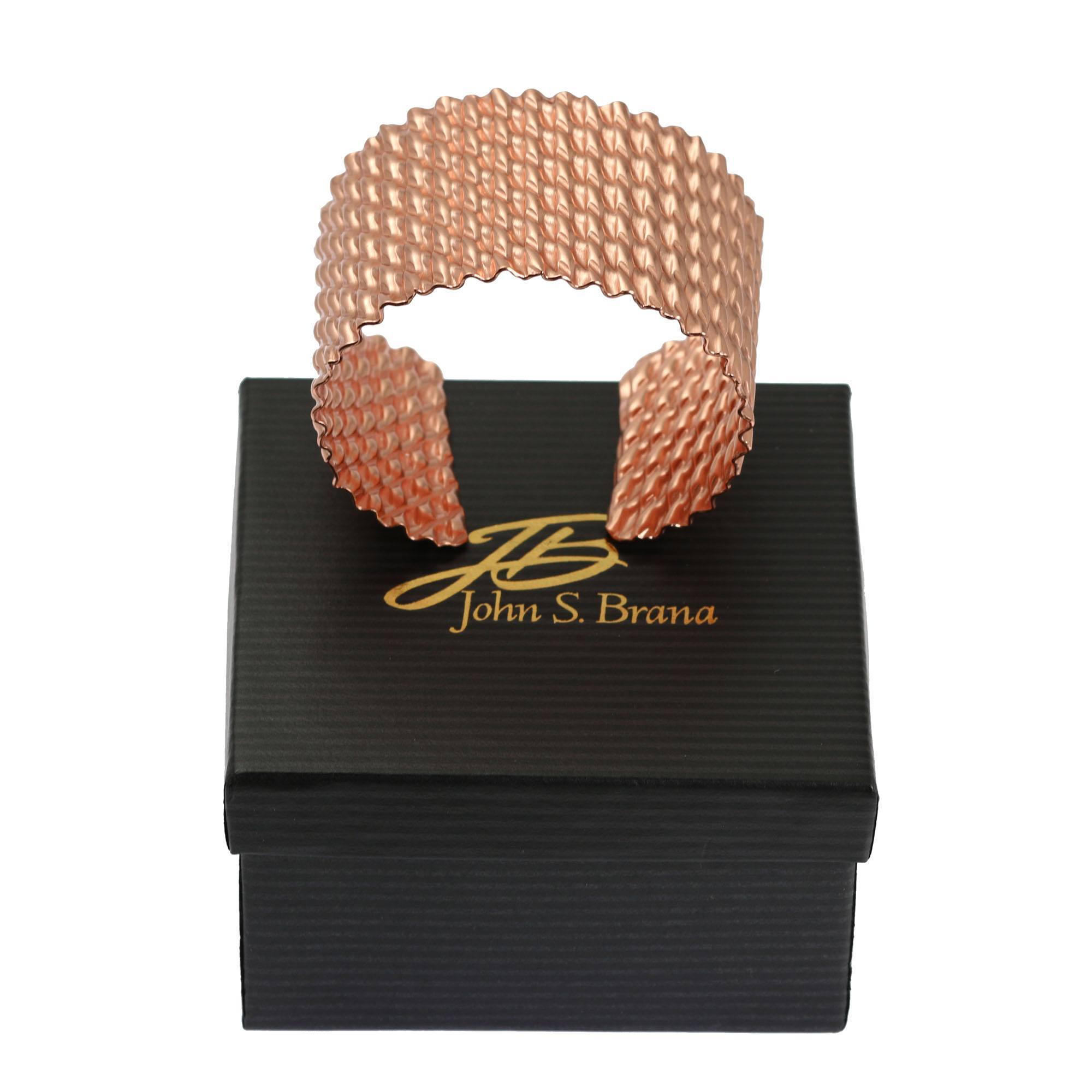 Double Corrugated Copper Cuff on top of a Black Gift Box
