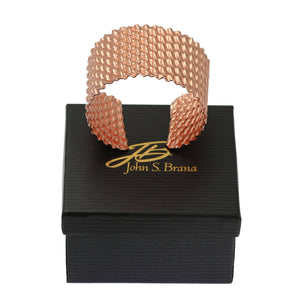 5 of 7: Double Corrugated Copper Cuff on top of a Black Gift Box