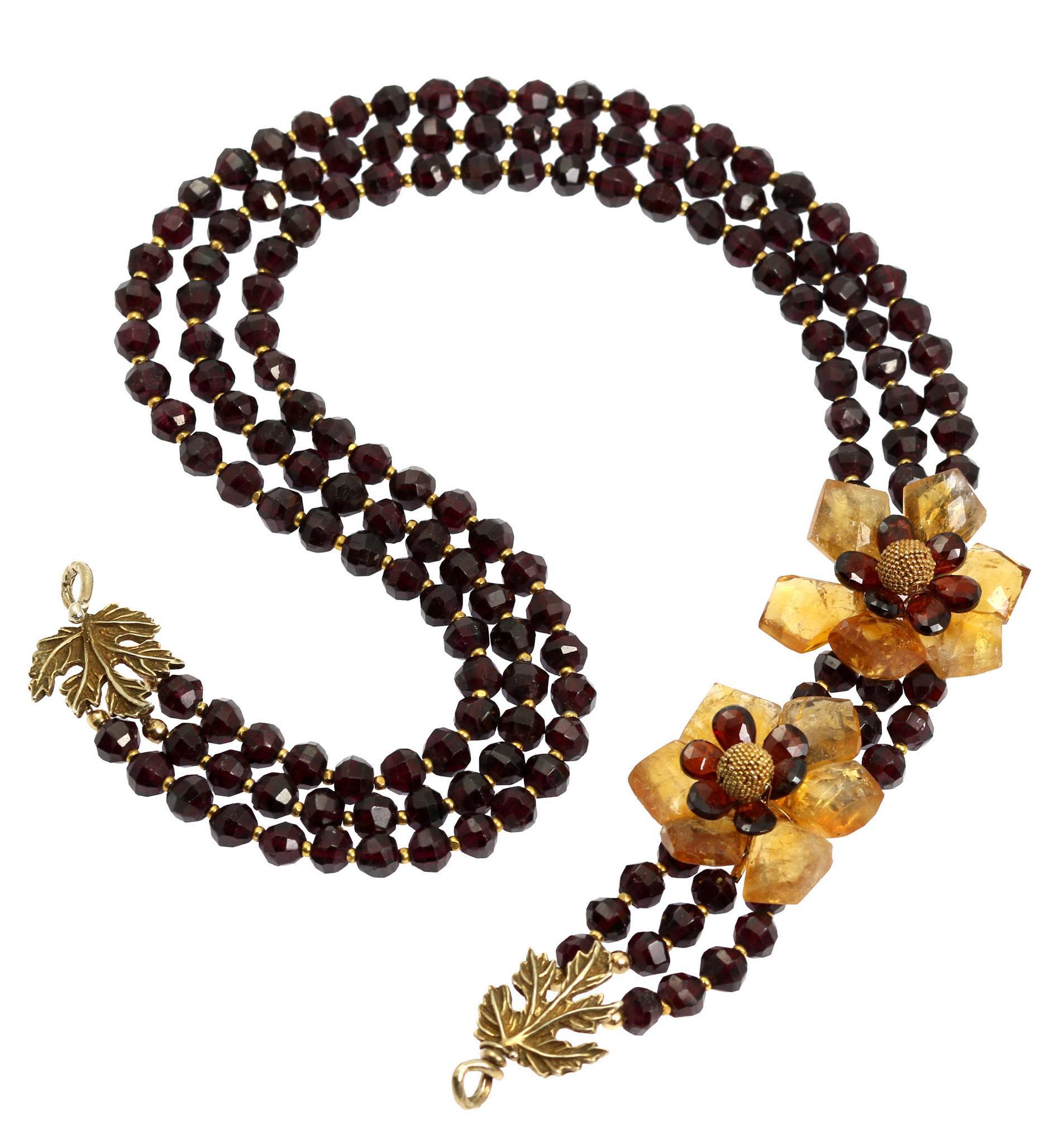 Detail View of Faceted Garnets And Citrine Flower Necklace