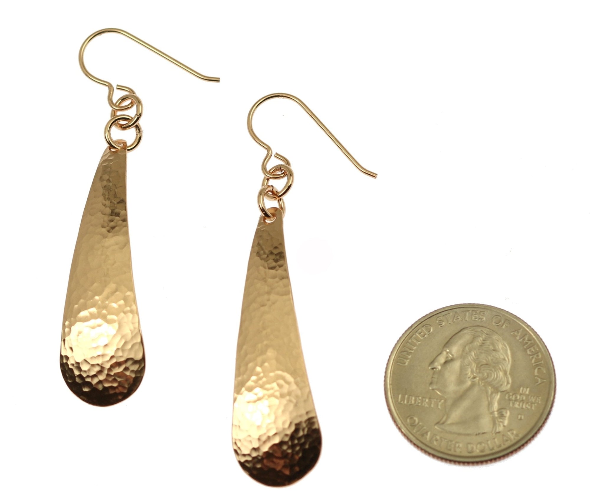Size of Hammered Bronze Long Teardrop Earrings compared to a US Quarter Coin