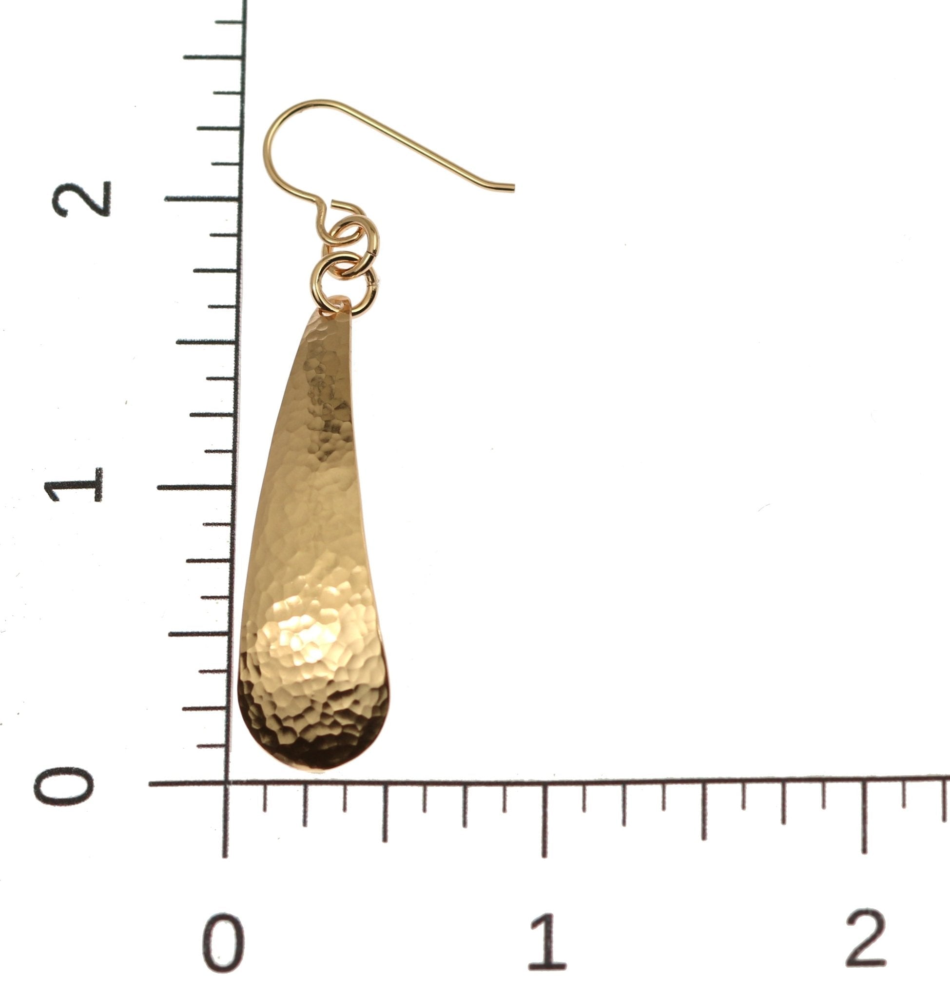 Scale of Hammered Bronze Long Teardrop Earrings on Ruler for Size Dimensions