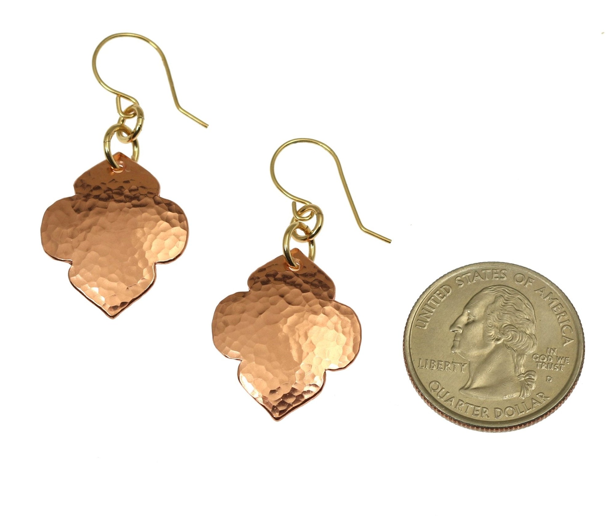 Size of Hammered Copper Quatrefoil Dangle Earrings compared to a US Quarter Coin