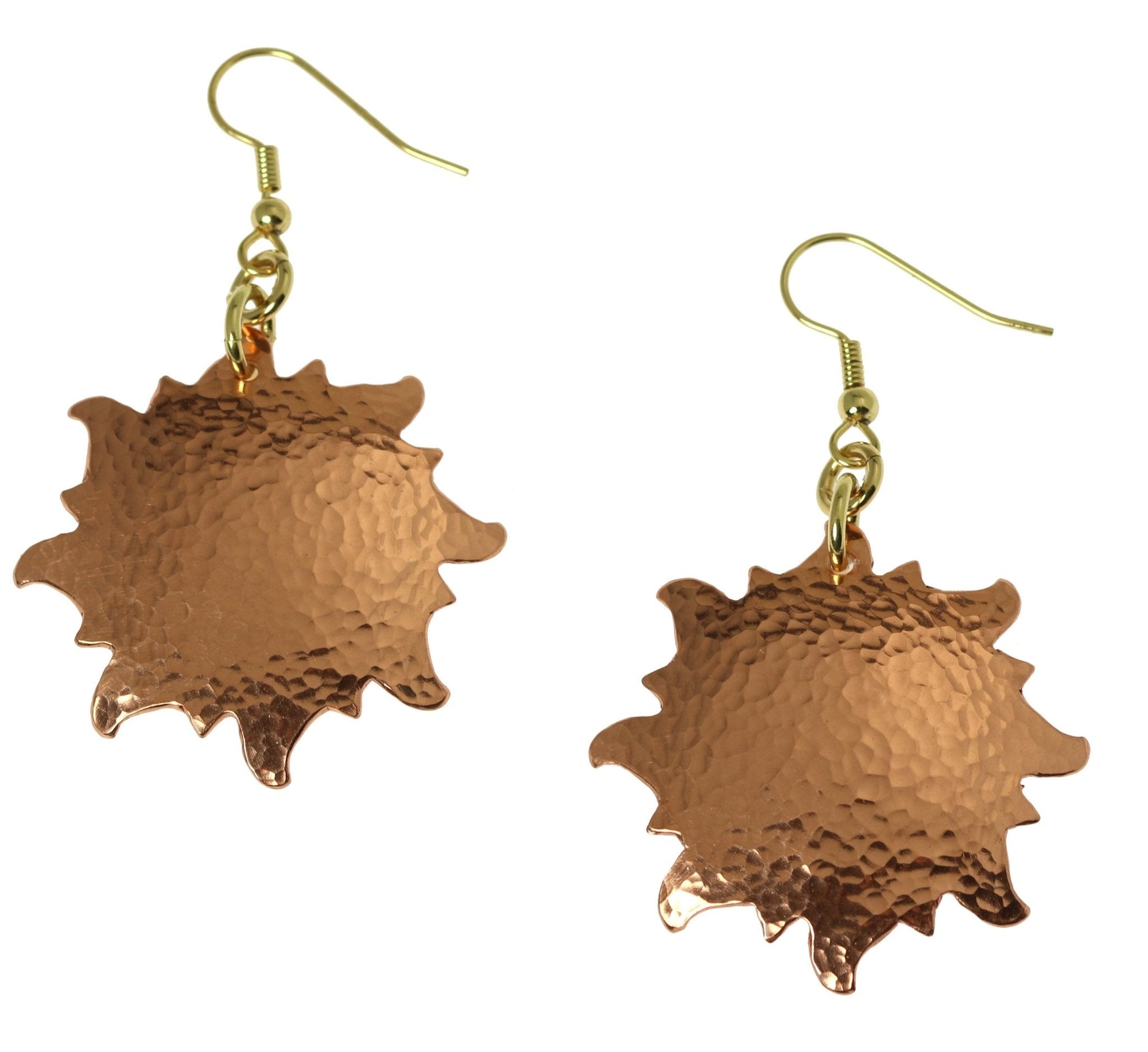 A Pair of Hammered Copper Sunburst Earrings on a White Background