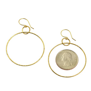 3 of 5: Size of Hammered Nu Gold Brass Hoop Earrings compared to a US Quarter Coin