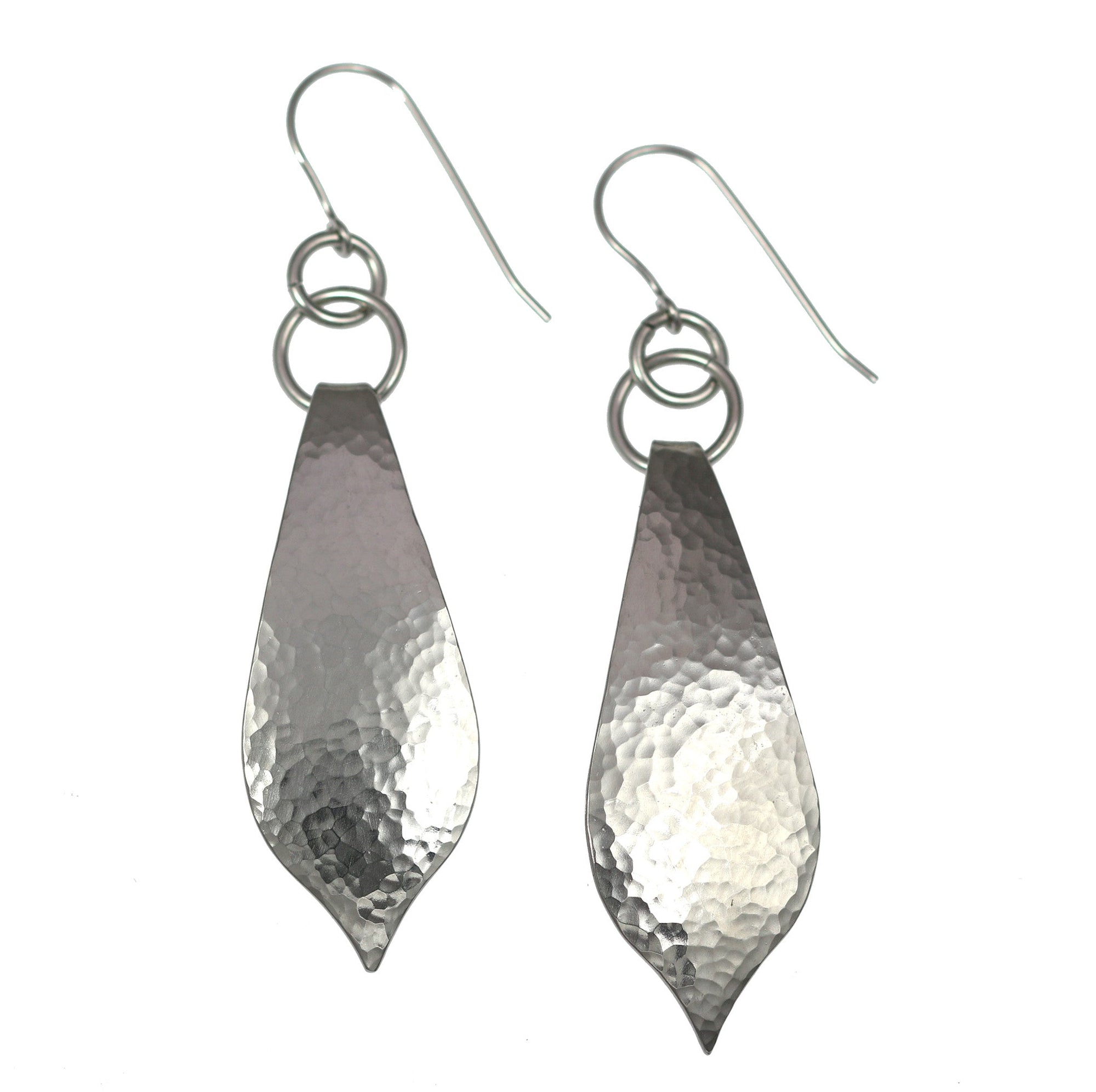 A Pair of Hammered Stainless Steel Marrakesh Drop Earrings on a White Background