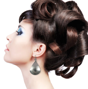 3 of 5: Woman Wearing Hammered Stainless Steel Teardrop Earrings