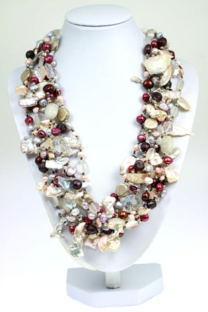 1 of 5: A Keishi Cornflake Pearl Beaded Gemstone Necklace on a White Neck Display