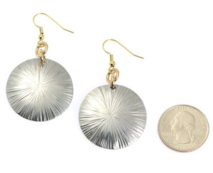 2 of 3: Size of Large Aluminum Sand Dollar Disc Earrings compared to a US Quarter  Coin