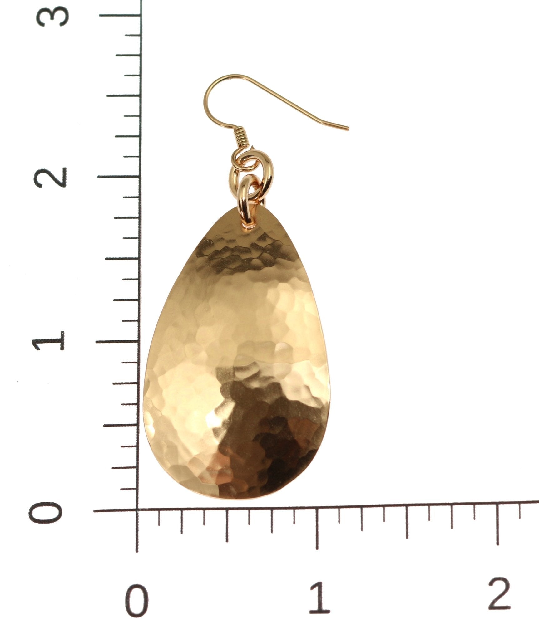 Scale of Large Hammered Bronze Teardrop Earrings on Ruler for Size Dimensions