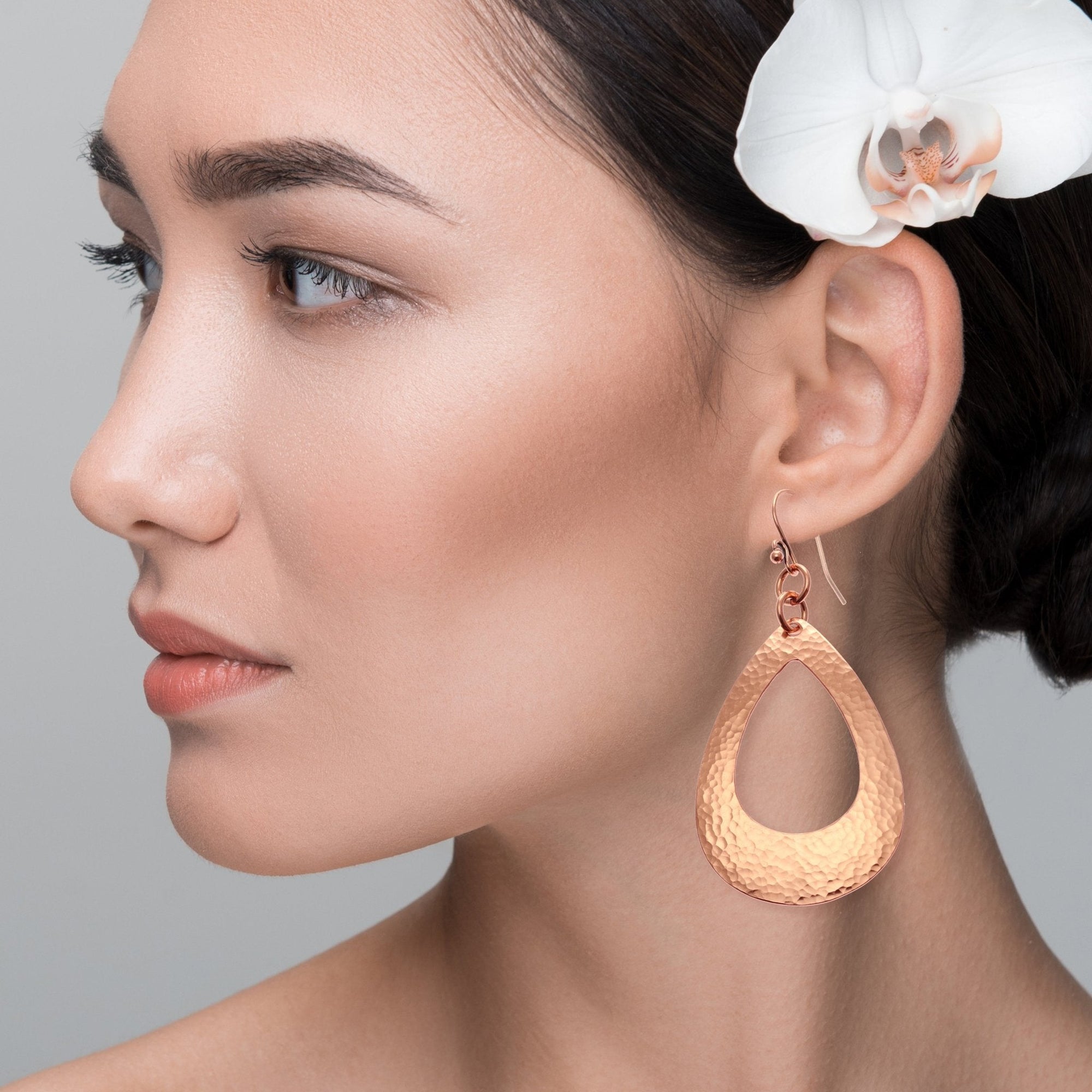 Female Model Wearing Large Hammered Copper Teardrop Earrings