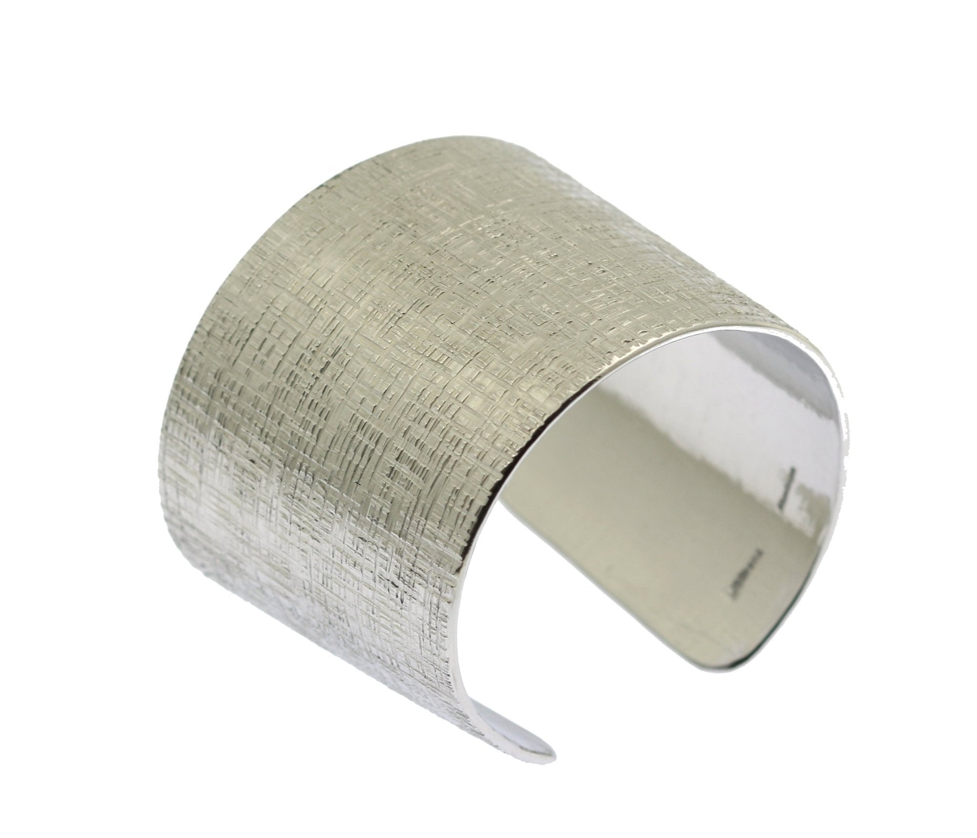 Detail of Linen Texturized Aluminum Cuff