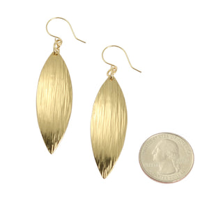 3 of 4: Size of Medium Chased Nu Gold Brass Leaf Earrings compared to a US Quarter Coin