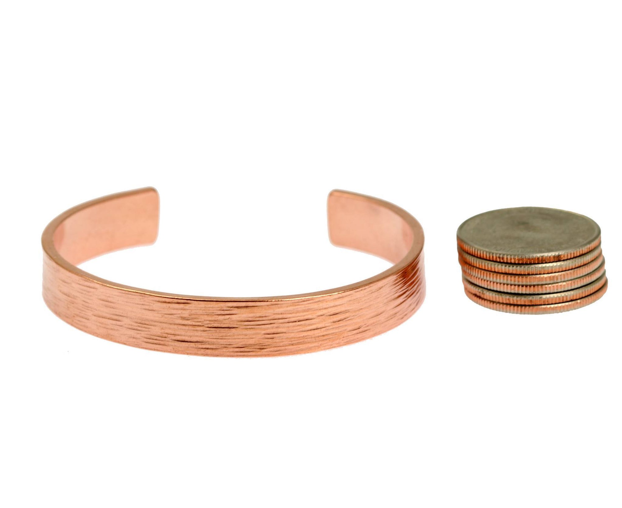 Width of 10mm Wide Men's Wide Bark Copper Cuff Bracelet compared to a stack of 6 US Quarter Coins