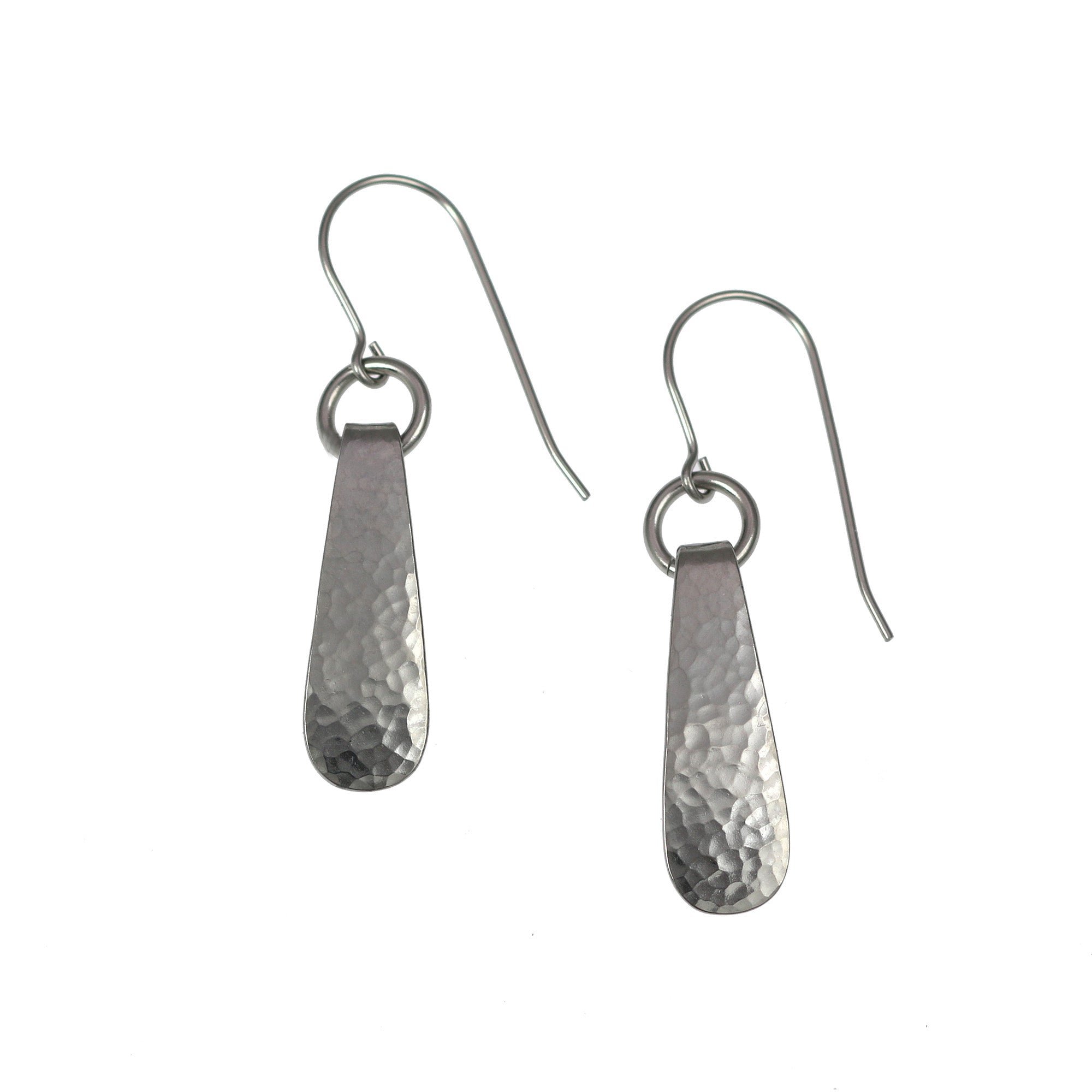 A Pair of Mini Hammered Stainless Steel Drop Earrings on a White Background