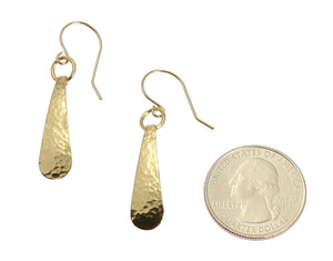 2 of 3: Size of  Mini Hammered Teardrop Nu Gold Brass Earrings compared to a US Quarter Coin