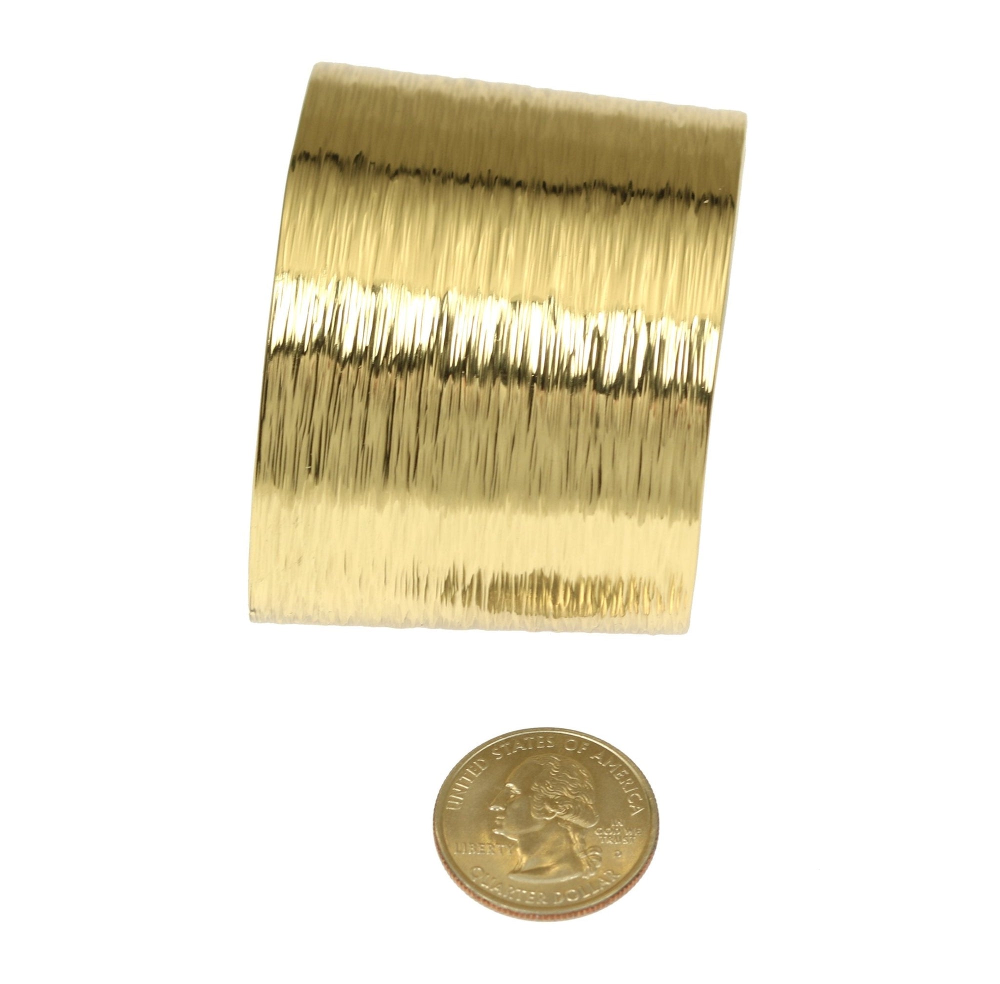 Width of Nu Gold Brass Bark Cuff compared to a US Quarter Coin