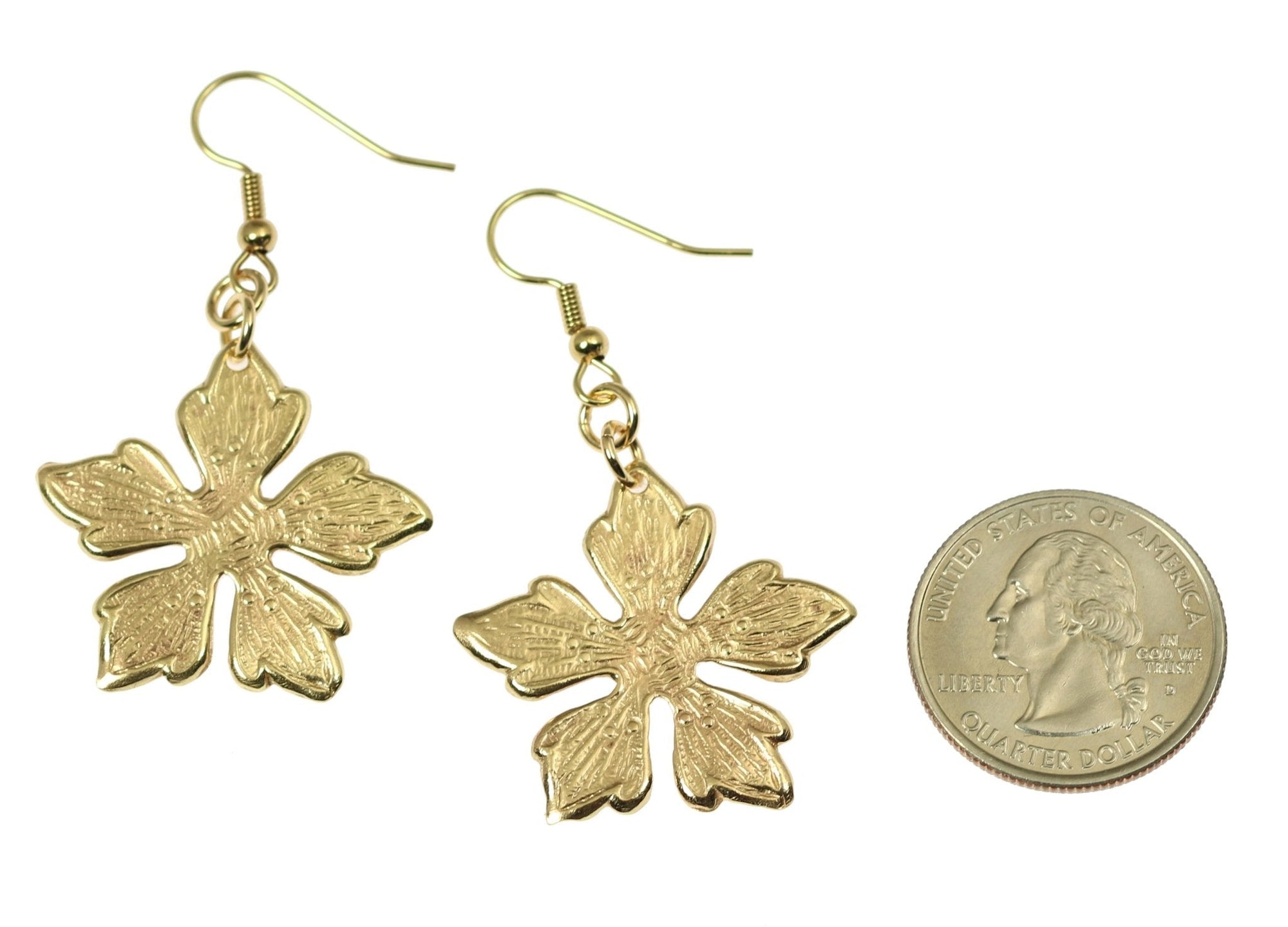 Size of Nu Gold Buttercup Flower Earrings compared to a US Quarter Coin