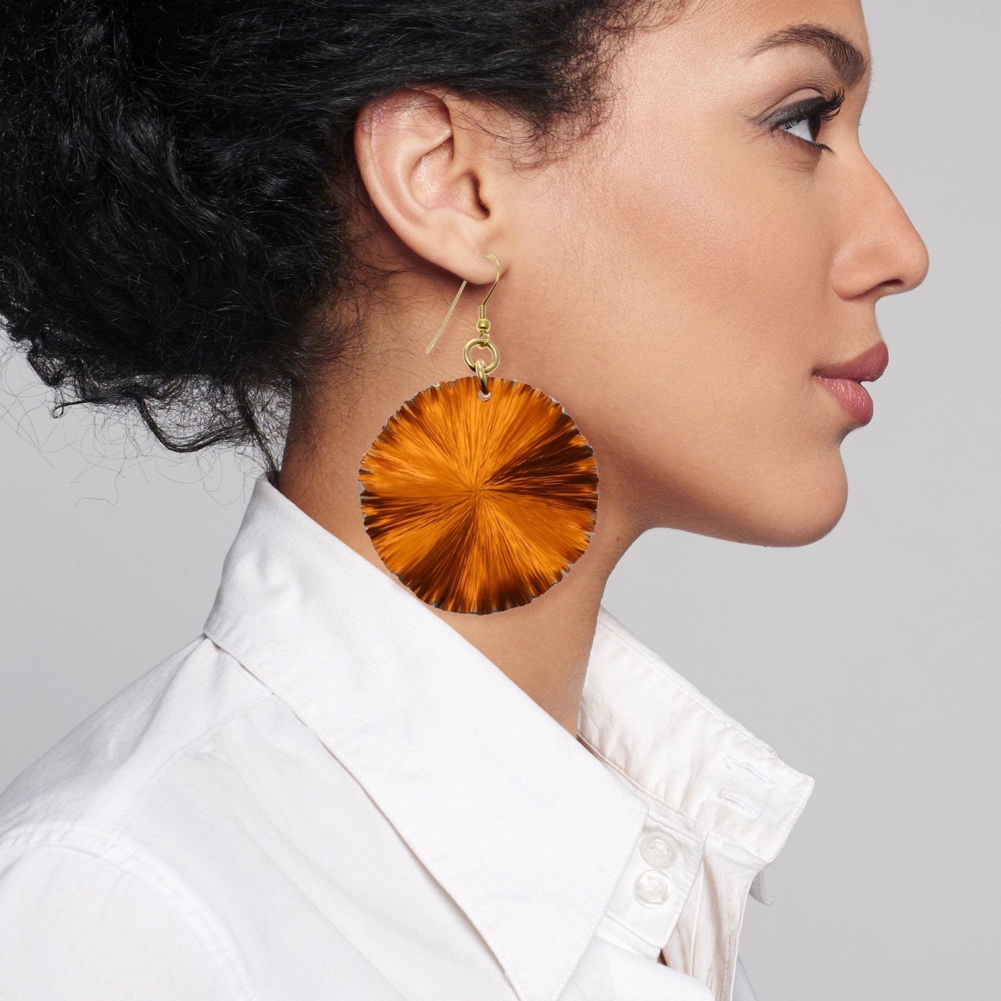 Model Wearing Orange Anodized Aluminum Lily Pad Earrings