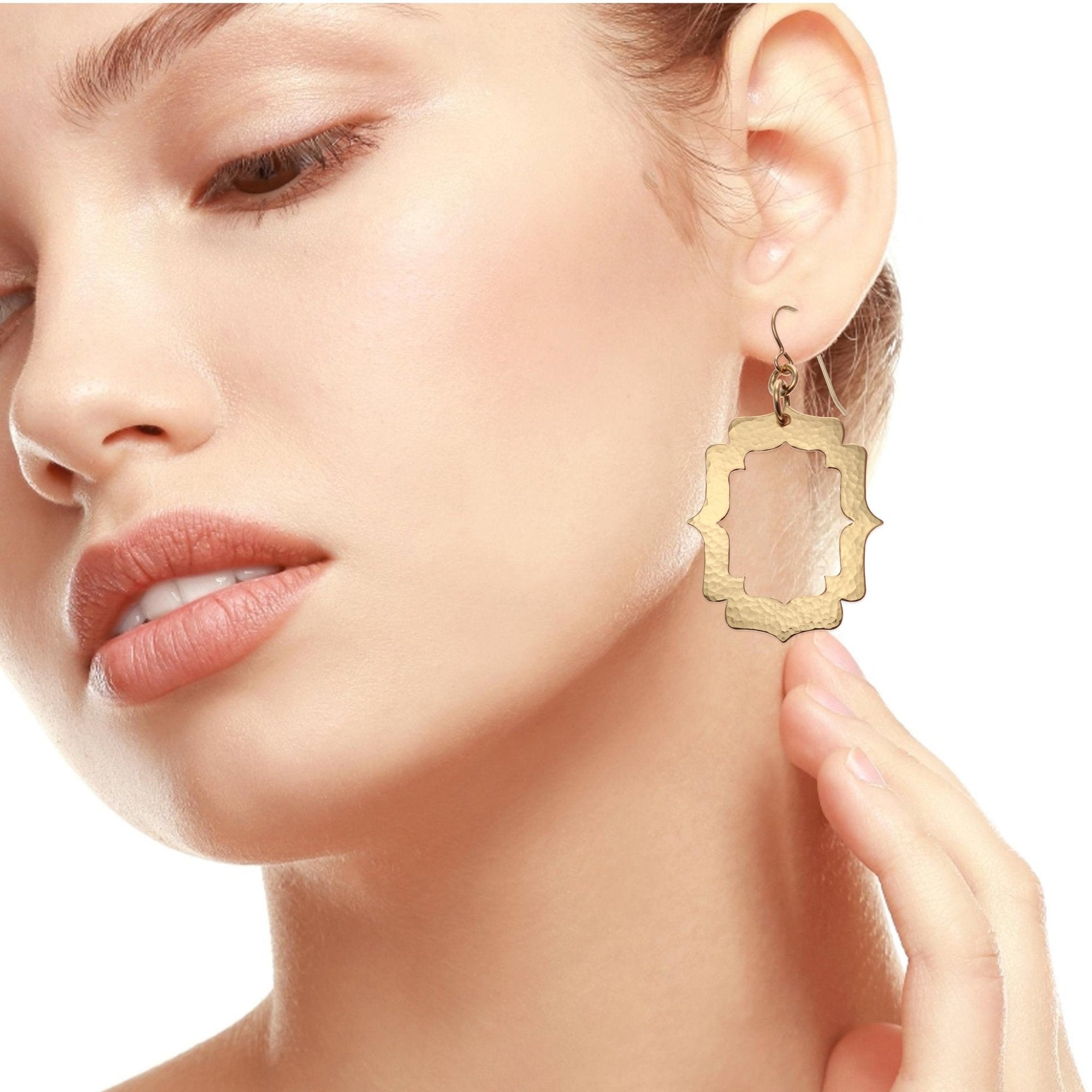 Model Wearing Pierced Hammered Bronze Arabesque Earrings
