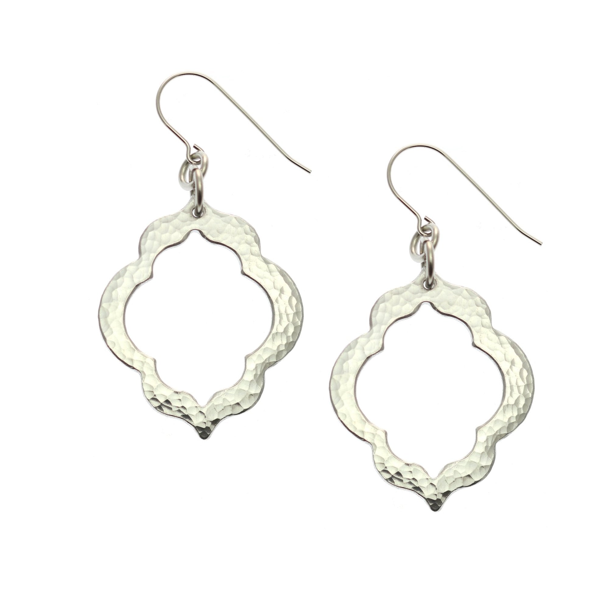A Pair of Pierced Hammered Quatrefoil Aluminum Earrings on a White Background