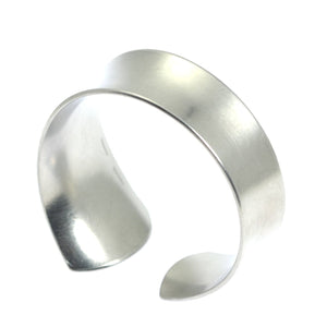 6 of 8: Shape of Tapered Brushed Anticlastic Aluminum Bangle