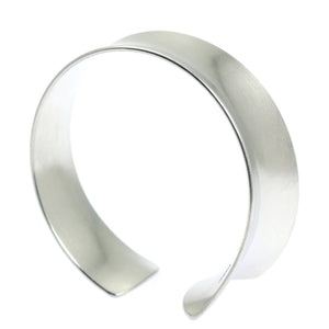 2 of 8: Right View of Tapered Brushed Anticlastic Aluminum Bangle 