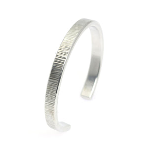 6 of 9: Left View of Thin Chased Aluminum Cuff Bracelet