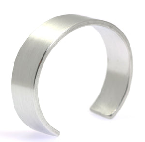 1 of 7: A 9mm Brushed Aluminum Cuff Bracelet on a White Background