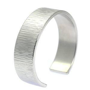 1 of 8: A Chased Aluminum Cuff Bracelet on a White Background