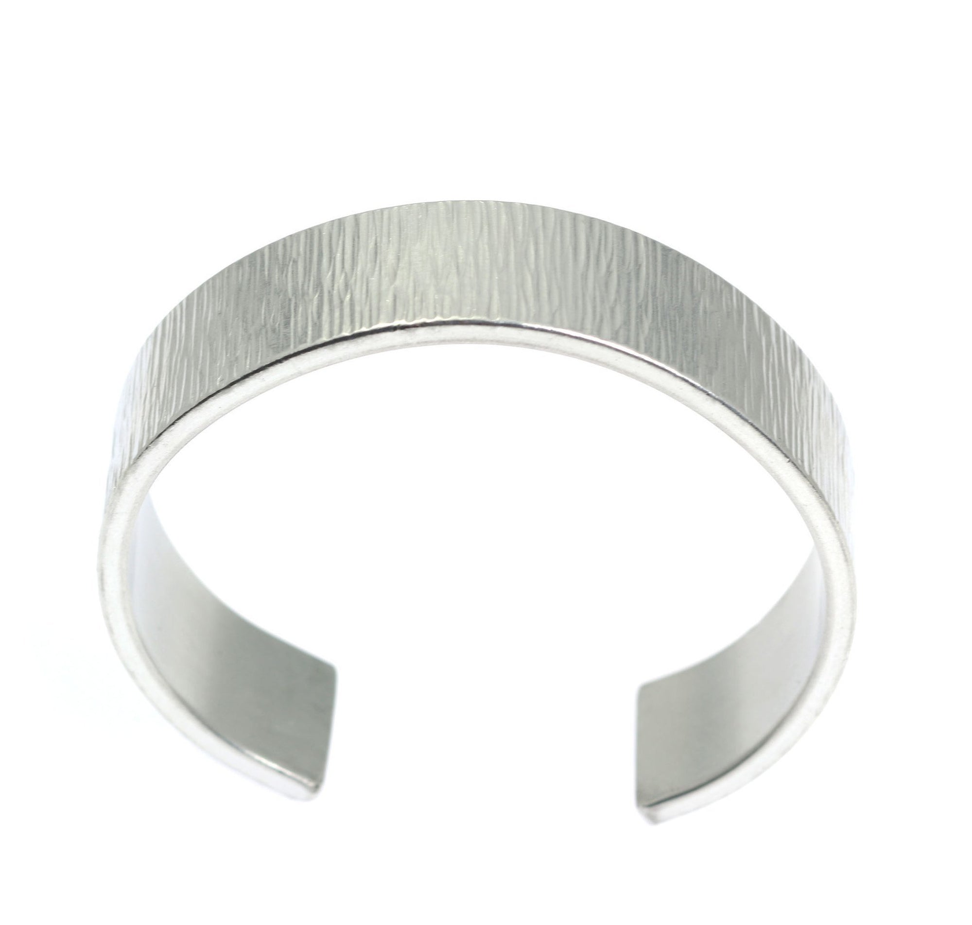Shape of Chased Aluminum Cuff Bracelet on a White Background