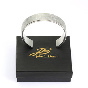 8 of 8: Linen Aluminum Cuff Bracelet on Top of a Gift Box